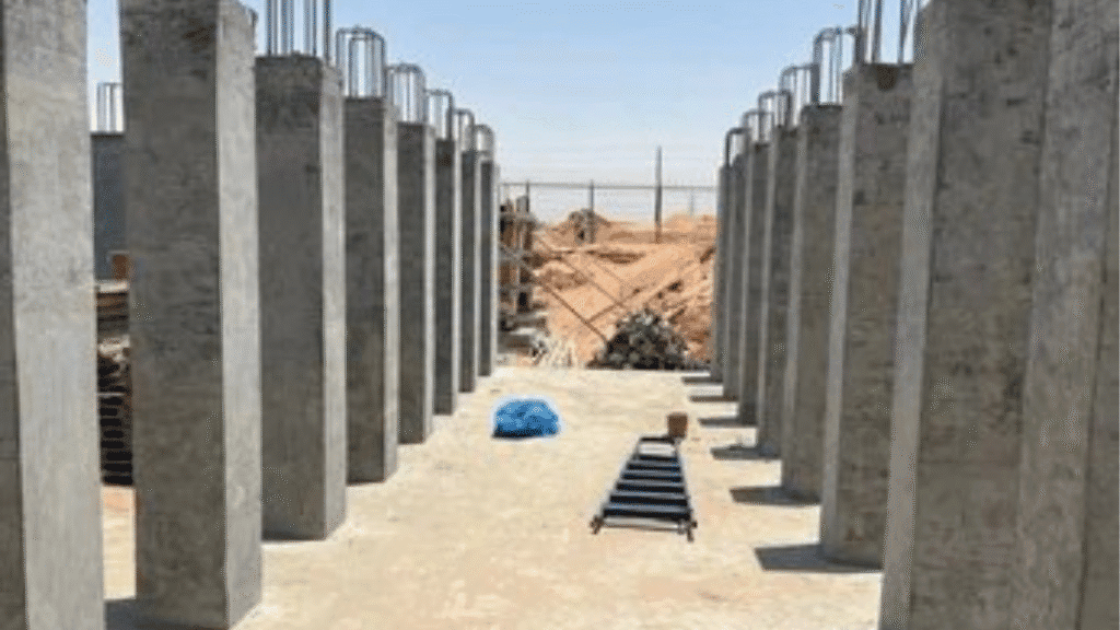 An RCC (Reinforced Cement Concrete) column is a vertical structural element designed to support loads in a building or structure. It consists of concrete reinforced with steel bars.