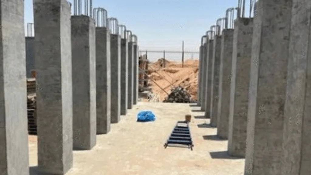 An RCC (Reinforced Cement Concrete) column is a vertical structural element designed to support loads in a building or structure. It consists of concrete reinforced with steel bars.